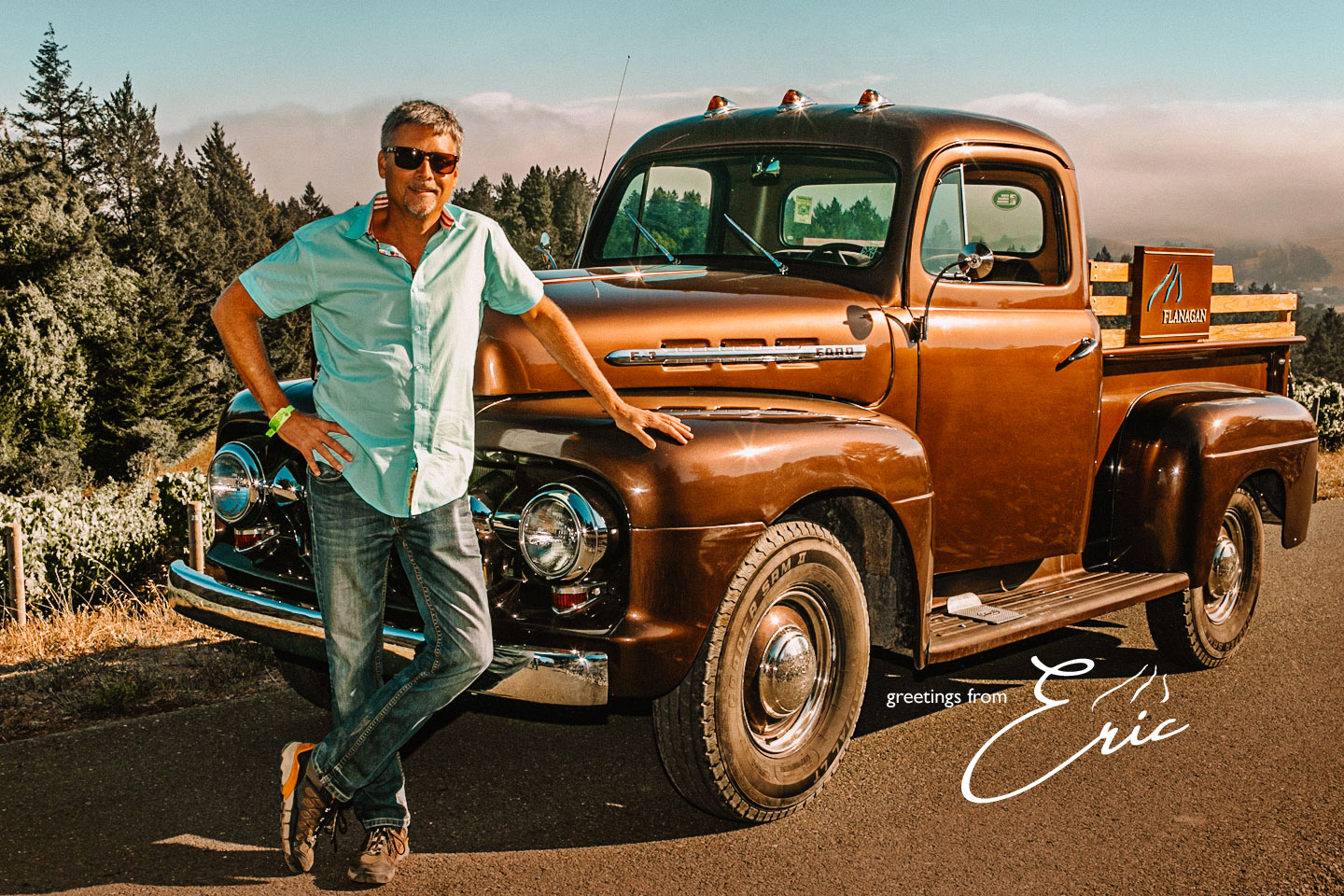 Eric standing next to classic truck
